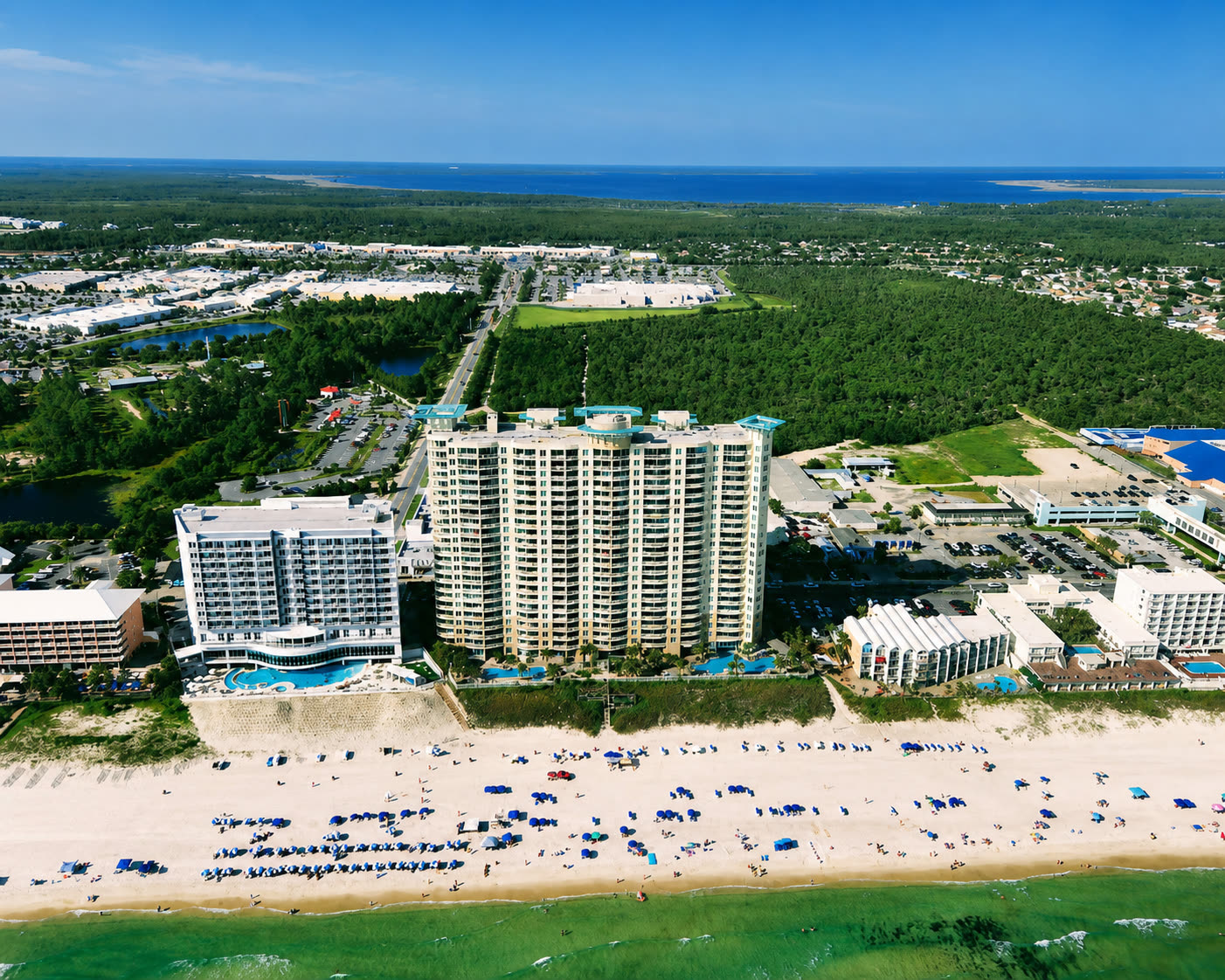 Aerial beachfront view of Aqua Condominiums in Panama City Beach.